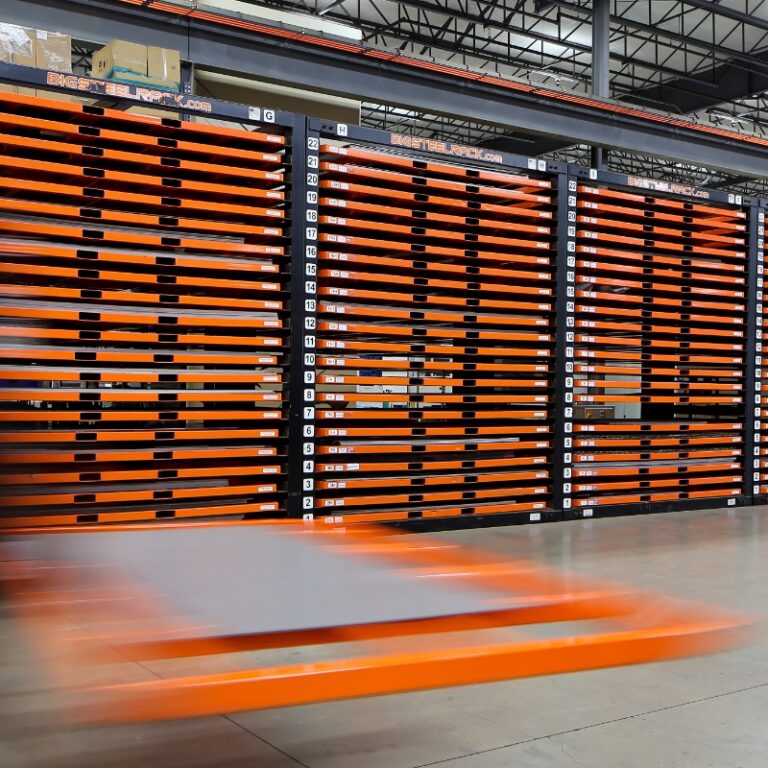 forklift moving sheet metal through warehouse