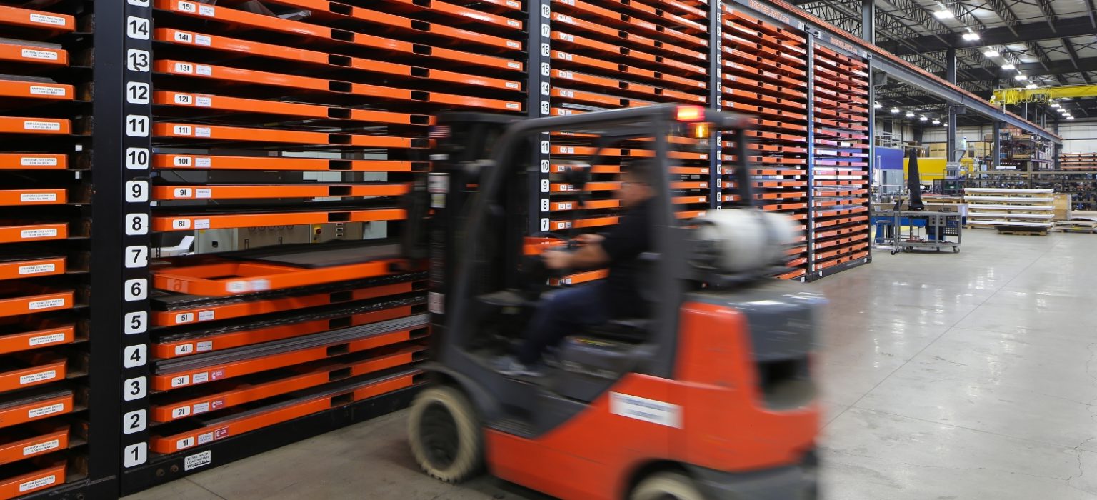 forklift moving sheet metal